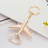 Porte-cle-decapsuleur-avion-rose-gold